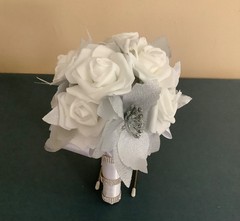 Silver poinsettia and rose wedding bouquet