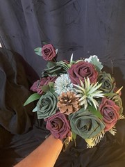 Burgundy And Emerald Green Hand tied Bouquet With Matching Boutonnière.