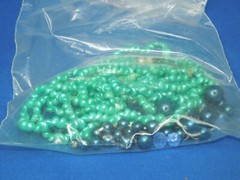 Wedding craft supplies – beads, wired ribbon with beads, leaves, clear doves