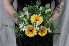 Gold/yellow gerbera daisy & white freesia floral bouquet w/ boutonniere