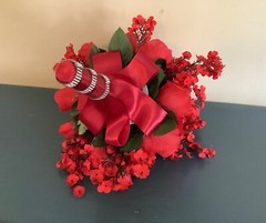 Red roses, rosebuds and red baby’s breath bridal bouquet
