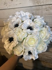 White Roses with Black center Anemone with Matching boutonnière ( magnet)