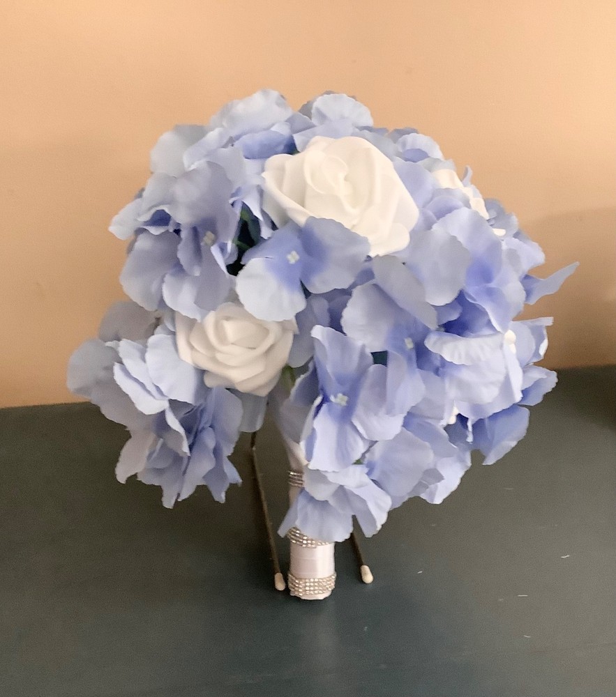 Periwinkle Hydrangea and white rose wedding bouquet