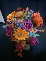 Burnt Orange And Magenta Bouquet In A Holder with Matching Boutinnier