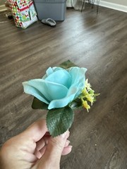 Silk Boutonnière Made With A Turquoise Rose With Yellow Filler. Perfect For Prom