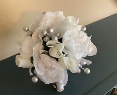 White roses, white rosebuds and silver berries bridal bouquet