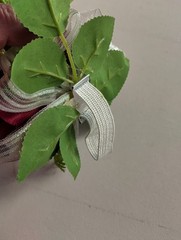 Cute little rose and orchid wrist corsage