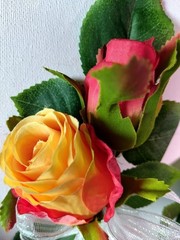 Formal pin on boutonniere set of roses