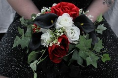 Red and white roses, black calla lilies floral bouquet w/ matching bouquet