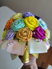 Handmade bouquet of artificial ribbon roses. Each flower is handmade.
