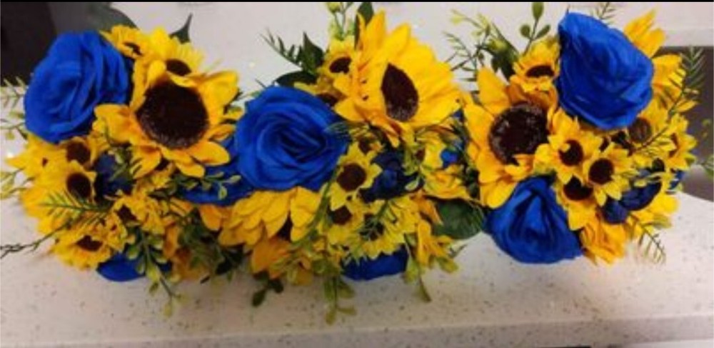 Bridesmaid flower bouquets. Artificial sunflowers and roses
