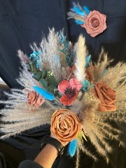 Teal and Burnt Orange fall BoHo theme with matching Boutonnière