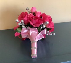 Pink roses, rosebuds and silver berries bridal bouquet