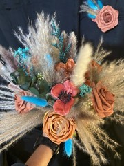 Teal and Burnt Orange fall BoHo theme with matching Boutonnière