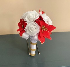Red poinsettia and rose wedding bouquet