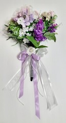 Wedding bouquet. Artificial flowers accessory with pearls and ribbons