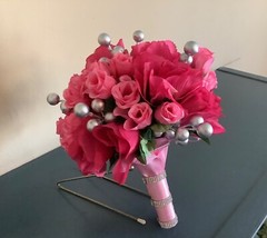 Pink roses, rosebuds and silver berries bridal bouquet