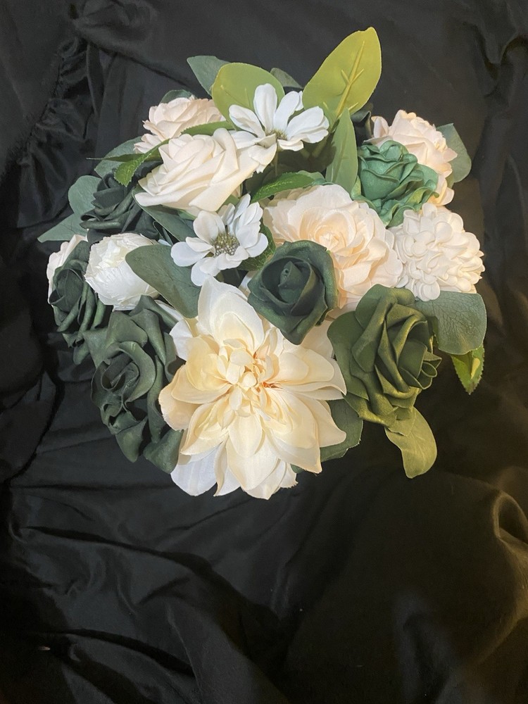 Hunter Green, Ivory and some white. Bridal bouquet with matching boutonnière.