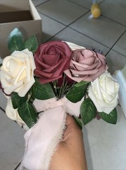 bouquet with burgundy, cream and pink colored flowers