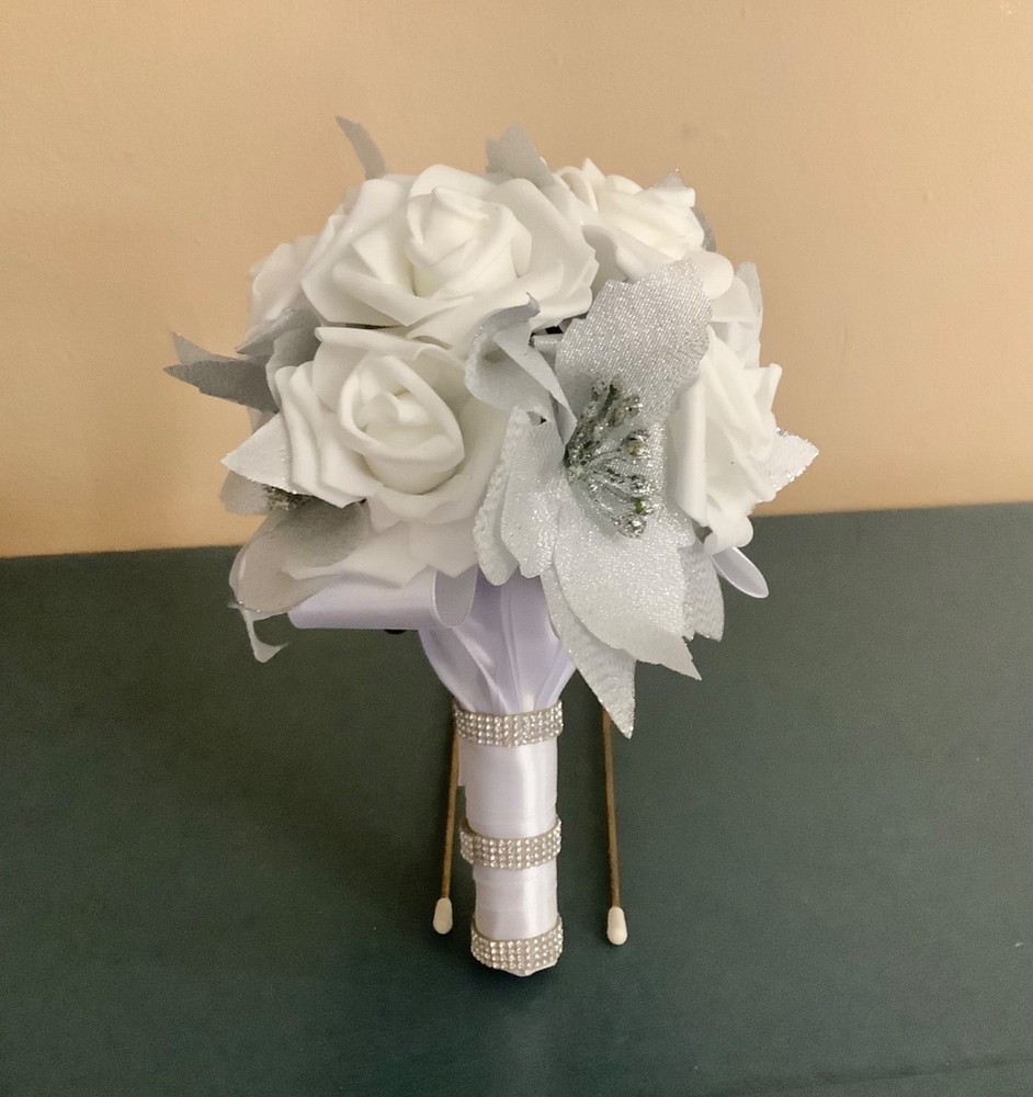 Silver poinsettia and rose wedding bouquet