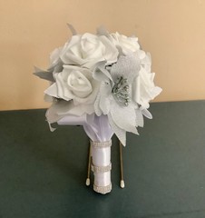 Silver poinsettia and rose wedding bouquet