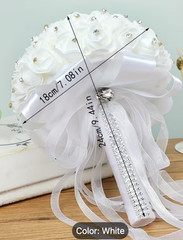 Wedding Bouquet Is a White Floral Arrangement