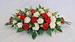 Table decoration flower arrangement rose leaves diamante sprays diamante pins
