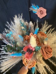 Teal and Burnt Orange fall BoHo theme with matching Boutonnière
