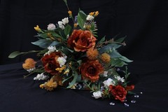 Burnt orange floral bouquet w/ boutonnierre