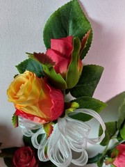 Formal pin on boutonniere set of roses
