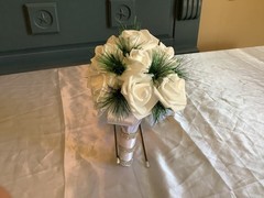 Winter pine and real touch rose bouquet