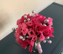 Pink roses, rosebuds and silver berries bridal bouquet
