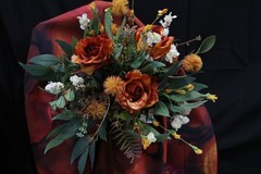 Burnt orange floral bouquet w/ boutonnierre