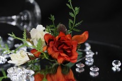 Burnt orange floral bouquet w/ boutonnierre