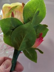 Formal pin on rose corsage