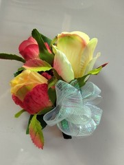 Formal pin on rose corsage