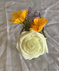 Ivory rose, lavender and yellow daisy boutonniere