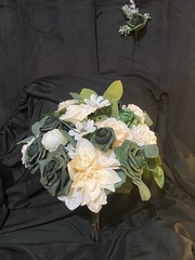Hunter Green, Ivory and some white. Bridal bouquet with matching boutonnière.