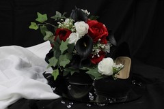 Red and white roses, black calla lilies floral bouquet w/ matching bouquet