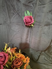 Burnt Orange And Magenta Bouquet In A Holder with Matching Boutinnier