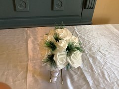 Winter pine and real touch rose bouquet