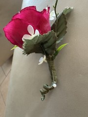 Silk Boutonnière in a Hot Pink Rose And White Filler. Perfect For Prom
