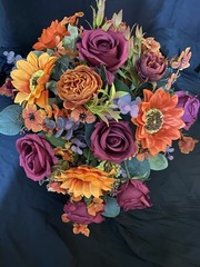 Burnt Orange And Magenta Bouquet In A Holder with Matching Boutinnier