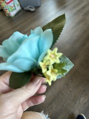 Silk Boutonnière Made With A Turquoise Rose With Yellow Filler. Perfect For Prom