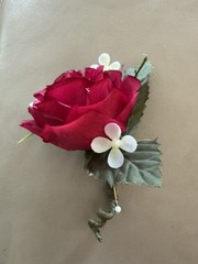 Silk Boutonnière in a Hot Pink Rose And White Filler. Perfect For Prom