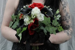 Red and white roses, black calla lilies floral bouquet w/ matching bouquet