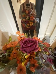 Burnt Orange And Magenta Bouquet In A Holder with Matching Boutinnier