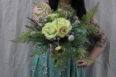 Light green rose & ranunculus w/ lavendar hints w/ matching boutonniere