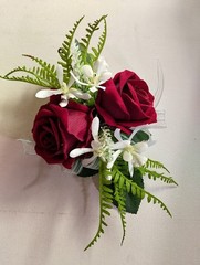 Cute little rose and orchid wrist corsage