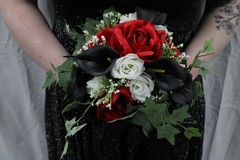 Red and white roses, black calla lilies floral bouquet w/ matching bouquet